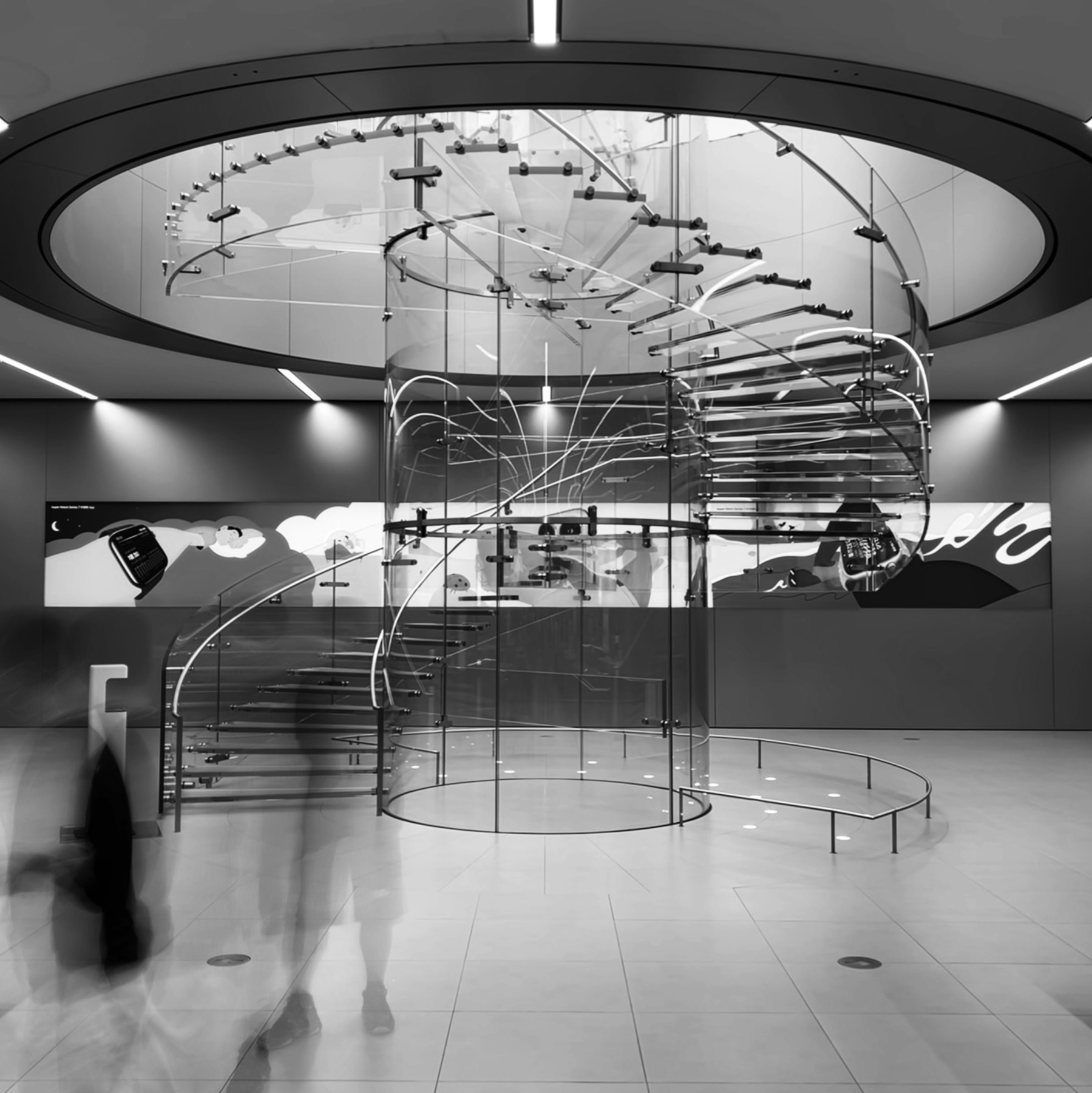 A black and white spiral staircase seen from below